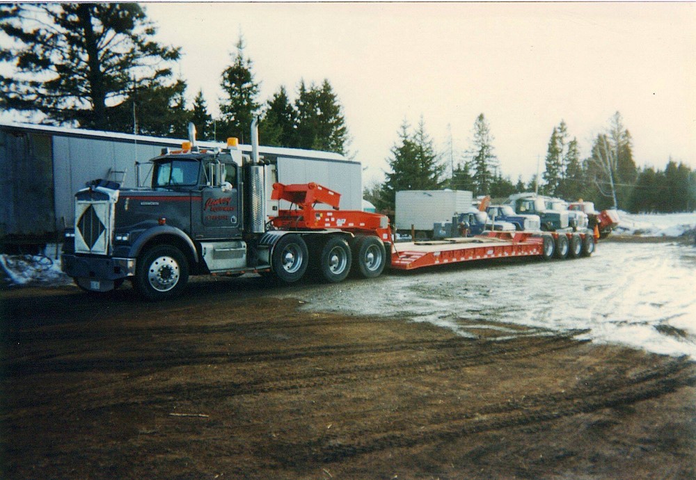 Jonroy Equipment Rentals - Tractor and new lowbed in 1996